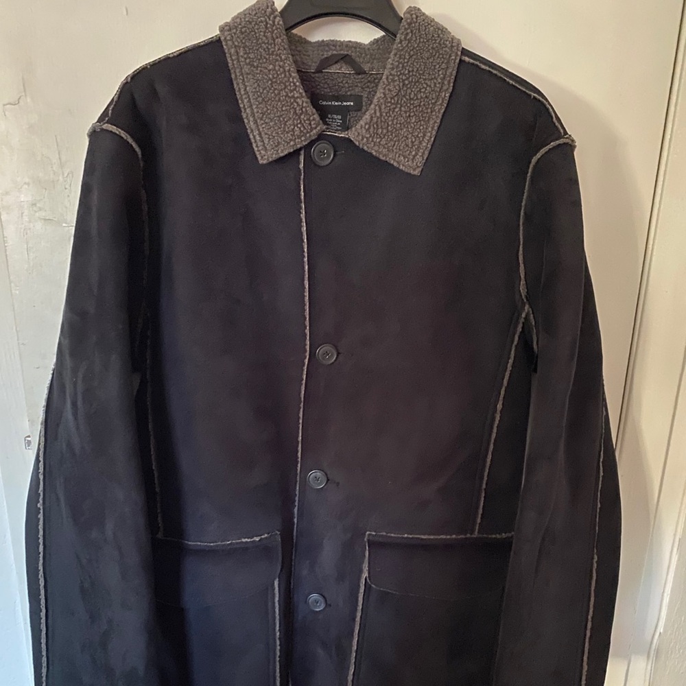 Navy blue shearling coat.